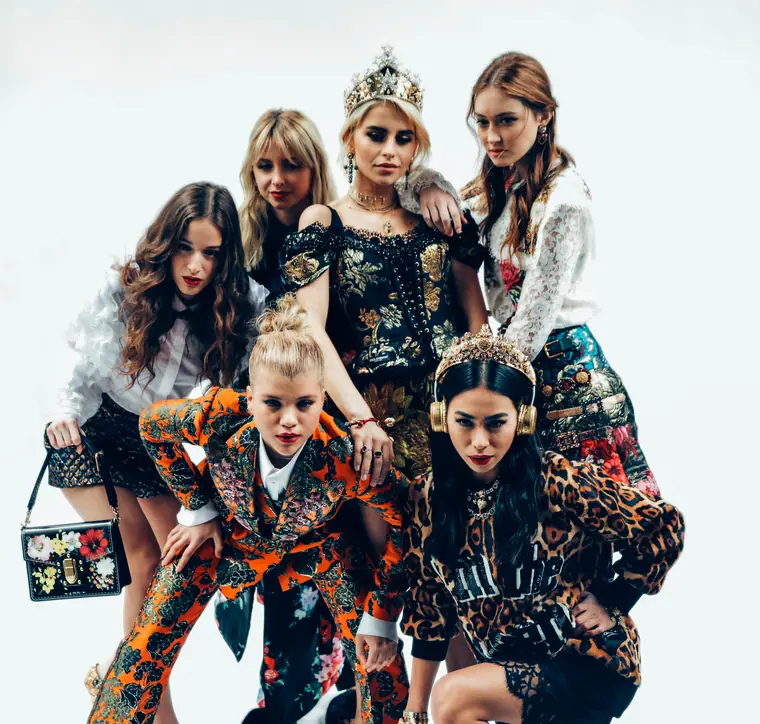 Dolce & Gabbana: models in jewelled crowns and brocade posing together