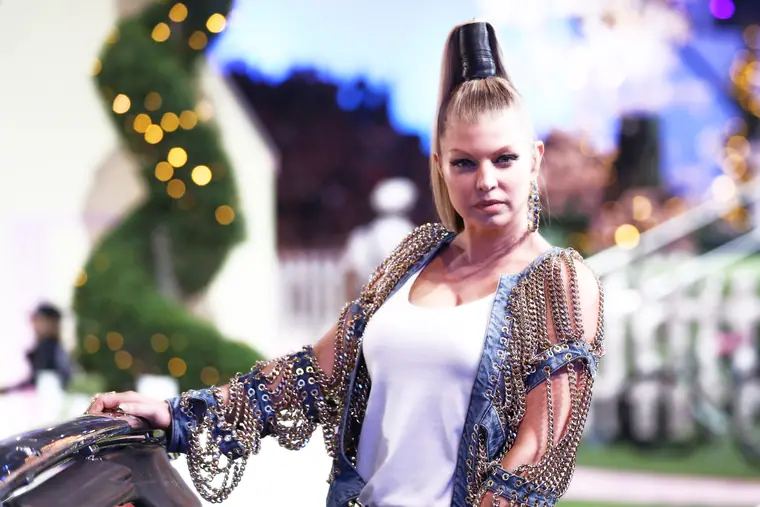 Fergie on a garden-set runway