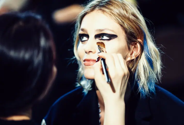 Anja Rubik with graphic eyeliner, backstage