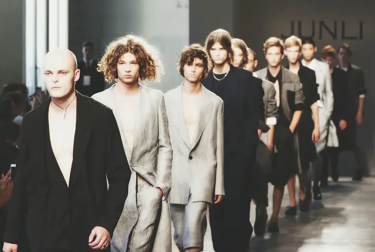 Menswear line-up in pale tailoring