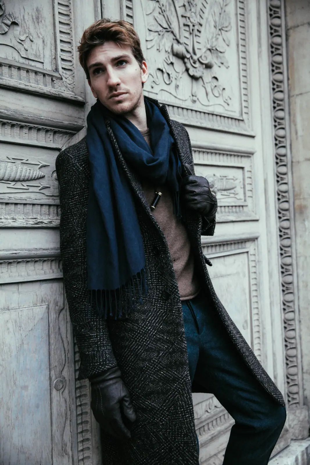 Alan Capelli Goetz against an ornate doorway