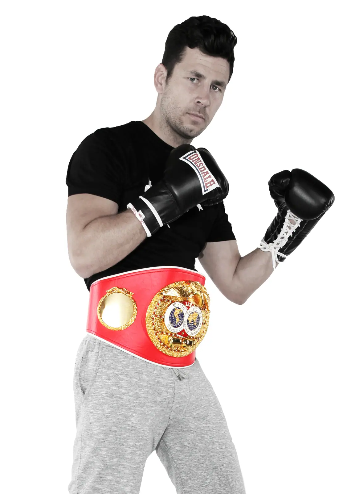 Darren Barker in boxing gloves with a title belt
